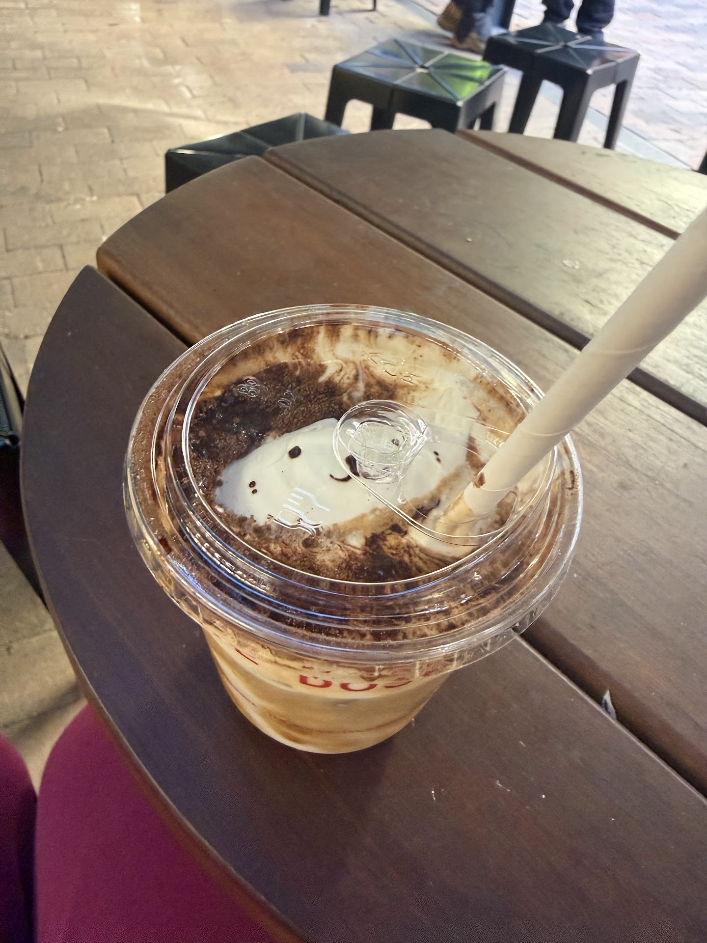 The Dose signature iced coffee on an outdoor table